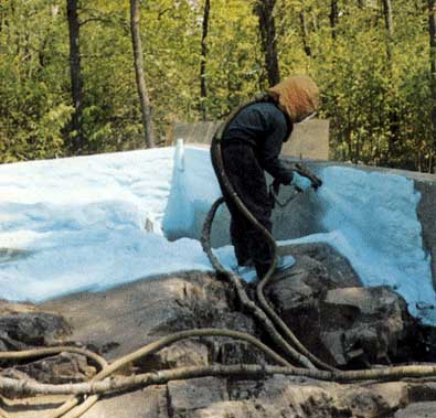 Spray Insulation on bedrock prior to building home.